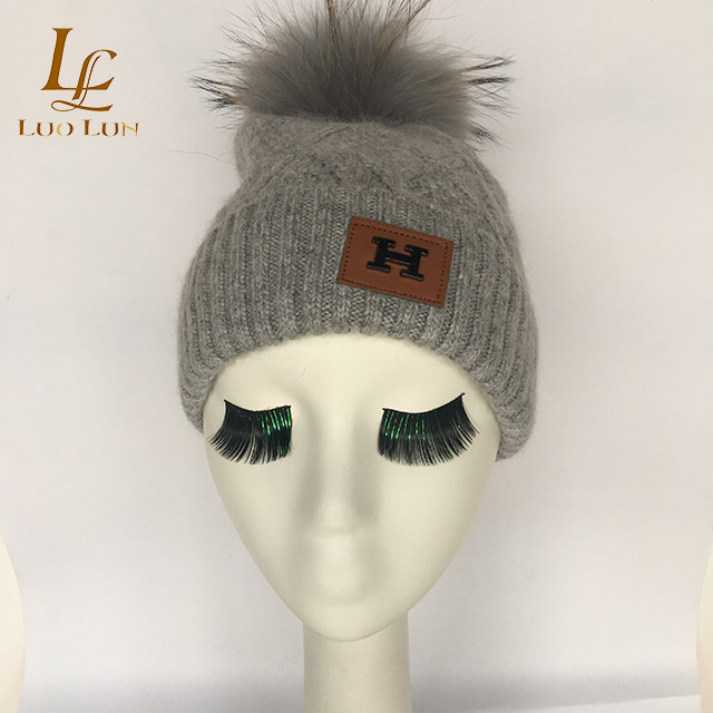 Fashion fried dougt twist real wool knitted hat with big raccoon fur ball